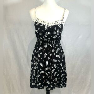 Black and white geometric print smocked sundress with pockets size large